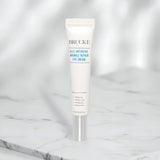 Brucke A.C.C. Intensive Wrinkle Repair Eye Cream tube on a marble surface with a white background
