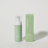 Green bottle and box of 'wbetter' product on a light gray background