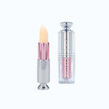 Lip balm with pink cap and clear container on white background